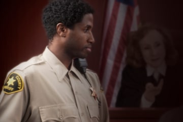 corrections officer in courtroom